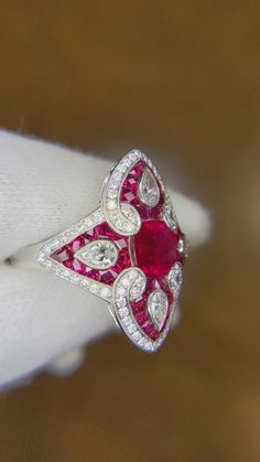 Elegant Gia Certified Ruby Ring, Red Diamond Ring With Brilliant Cushion Cut, Red Cushion Cut Diamond Ring With Brilliant Cut, Red Cushion Cut Brilliant Diamond Ring, Luxury Red Marquise Cut Ruby Ring, Luxury Marquise Cut Red Ruby Ring, Red Marquise Cut Diamond Ring, Red Ruby Ring With Marquise Cut Diamond, Classic Gia Certified Diamond Ring With Lab-created Ruby