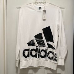 Shirt Is Brand New, Has Never Been Worn. Fall Adidas Logo Cotton Sweatshirt, Adidas Cotton Sweatshirt Relaxed Fit, Adidas Cotton Sweatshirt With Relaxed Fit, Adidas Relaxed Fit Cotton Sweatshirt, Oversized Adidas Sweatshirt With Long Sleeves, Oversized Long Sleeve Adidas Sweatshirt, White Winter T-shirt With Logo Print, Adidas Logo Long Sleeve Sweatshirt For Fall, Adidas Logo Sweatshirt With Crew Neck For Fall