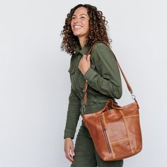 Our Best-selling Bianca, re-invented! Multi-functional, with multiple pockets for storage, hidden phone pocket, + complete organizer makes this heirloom quality bag perfect for your everyday. Details 100% Full-grain leather handcrafted by artisans in South America and India. Every hide is unique so you will notice natural variations in the grain texture and shading which are hallmarks of high-quality. Features 3 exterior pockets + one hidden phone pocket Top zip entry to main compartment Interio Versatile Cognac Bucket Bag For Everyday, Versatile Cognac Hobo Bag For Everyday Use, Versatile Cognac Hobo Bag, Cognac Leather Backpack For Everyday Use, Versatile Cognac Shoulder Bag For Everyday Use, Leather Shoulder Bag With Pockets For Errands, Cognac Bucket Bag With Removable Pouch For Everyday Use, Brown Bucket Bag With Zipper Pocket For Everyday, Everyday Cognac Hobo Bag With Removable Pouch