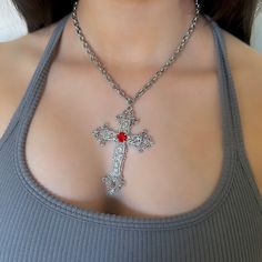 This Gothic Cross Necklace includes a Silver Big Cross Pendant making it a perfect vintage grunge jewelry gift for her. Featuring a statement red rhinestone on the center of the cross pendant, it blends religious jewelry elements with bold, edgy style. 𝐃𝐄𝐓𝐀𝐈𝐋𝐒:  ⭐️ Necklace lengths available: 14" 16" 18"  ⭐️ Big cross pendant size is 3" ⭐️ The large silver cross pendant is silver plated over metal. The chain necklace is made up of a high quality stainless steel, safe for those with sensit Chunky Cross Necklace Outfit, Red Cross Necklace For Valentine's Day, Red Retro Metal Jewelry, Retro Red Metal Jewelry, Vintage Red Cross Jewelry, Supernatural Accessories, Cross Necklace Aesthetic, Big Silver Necklace, Gothic Cross Necklace