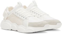 Low-top calfskin suede, mesh, and stretch jersey sneakers in white. · Reflective logo-woven trim throughout · Lace-up closure · Pull-loop at tongue · Padded sock-style collar · Logo-woven velcro strap at heel · Sculptural rubber midsole · Treaded rubber sole Supplier color: White Mesh Sneakers With Contrast Sole, White Mesh Sneakers With Contrast Sole, Modern Chunky Sneakers With Mesh And Rubber Sole, Modern Chunky Mesh Sneakers With Rubber Sole, White High-top Sneakers With Textured Sole For Athleisure, Modern Mesh High-top Sneakers With Laces, Modern Mesh High-top Sneakers, Casual Sports Chunky Sneakers With Mesh And Rubber Sole, Modern Mesh High-top Sneakers For Light Sports