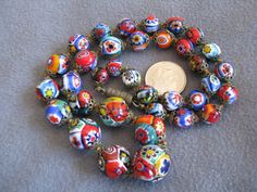 18" Vintage Venetian Murano Millefiori Bead Necklace Bright Colors Graduated | eBay $99.99 Antique Multicolor Beads For Gift, Antique Multicolor Beads For Gifts, Antique Multicolor Beaded Necklaces, Antique Multicolor Beaded Necklaces With Round Beads, Antique Multicolor Round Beads Necklace, Antique Style Colorful Beads For Gift, Antique Multicolor Round Bead Necklaces, Vintage Beaded Necklace With Bead Caps, Vintage Necklace With Bead Caps And Round Beads