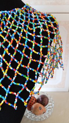 African Beaded wedding necklace, Zulu Cape necklace, Beaded shawl necklace, Christmas gift for her, Women jewelry, Bridesmaid gift This beaded bib necklace is superbly crafted which can be worn with any outfit at different occasions and it will absolutely makes you stand out. Main color - multicolor. The necklace can be available in different colors. Wholesale available at a fair price,please contact me. For any clarification,please send me a convo or an e-mail. Thank you for visiting and happy Multicolor Bib Necklaces With Dangling Round Beads, Multicolor Bib Necklace With Dangling Round Beads, Multicolor Bib Necklace With Round Dangling Beads, Multicolor Beaded Bib Necklace As Gift, Multicolor Faceted Beads Necklace For Celebration, Multicolor Faceted Beads For Celebration, Multicolor Large Beads For Celebrations, Multicolor Tiny Beads Bib Necklace For Gift, Festive Multicolor Beaded Necklaces With Tiny Beads