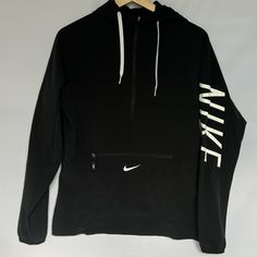 Nike Hoodie Top Nwot Super Lightweight Black Size Xs But Runs Very Big/Roomy Front Pocket Hoodie Attached Great For Rainy Days Athleisure Long Sleeve Outerwear With Logo Print, Nike Hoodie Track Jacket For Streetwear, Black Half-zip Hoodie With Drawstring Hood, Black Half-zip Hoodie For Outdoor, Moisture-wicking Black Hooded Top, Black Moisture-wicking Hooded Top, Black Half-zip Hoodie, Sporty Long Sleeve Activewear With Logo For Streetwear, Long Sleeve Activewear With Logo Print For Streetwear