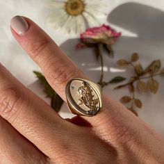 DESCRIPTION The June Birth Flower Signet Ring features one of the most famous and romantic flowers in the world, the rose. Shaped like a vintage saint charm with an intricate rose relief carving and a sparkling diamond, this statement ring is handmade just for you in Los Angeles. Show love to your favorite June baby (or yourself!) with this perfect addition to your everyday collection. Note that this piece is handmade to order. Please allow for a 3-4 week lead time as we craft this special ring. 14k Rose Gold Flower Ring With Birth Flower, Classic 14k Gold Flower Ring With Rose Cut Diamonds, Vintage Gold Signet Ring With Birthstone, Rose Gold Signet Ring With Single Diamond For Promise, Vintage Gold Signet Ring With Rose Cut Diamonds, Delicate Yellow Gold Birth Flower Rings, Heirloom Rose Gold Diamond Flower Ring, Rose Gold Signet Ring With Rose Cut Diamonds, Elegant Gold Signet Ring With Birth Flower