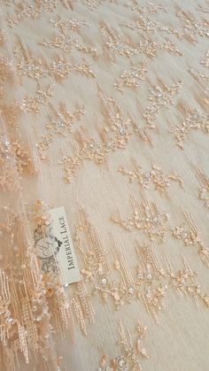 Peach 3D lace hand made fabric, Luxury hand made pearl beads by 3D flowers, French Lace, Embroidered lace, Wedding Lace, Bridal lace K00759 Article: K00798 Width: 125 cm Colors: peach Lace edge: Both sides scalloped The price is per meter (1 meters= 100 cm / 55.1 inch) Please note, there might be a slight difference in the color according to PC and Mobile devices! We recommend you to buy a sample before ordering to see the true color. You can purchase a sample here: https://www.etsy.com/listing/ Elegant Tulle Fabric With 3d Lace Embroidery, Elegant Lace Tulle Fabric With 3d Embroidery, Peach Lace, Scalloped Border, Dress Tops, Wedding Lace, Embroidery Floral, Lace Bridal, 3d Flowers