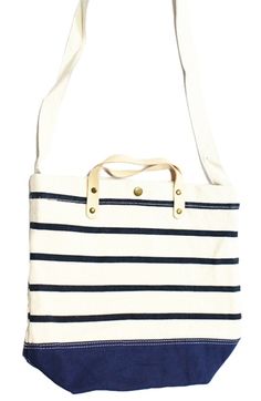 Top handle canvas bag with striped print and shoulder strap. 100% cotton. Length 14.75" height excluding handles 15". White Cotton Shoulder Bag With Leather Handles, Striped Canvas Shopping Bag, White Cotton Canvas Bag For On-the-go, White Cotton Shoulder Bag For On-the-go, Everyday Tote Canvas Bag With Striped Lining, Striped Canvas Rectangular Shoulder Bag, Striped Canvas Shoulder Bag For Shopping, Canvas Bags With Striped Lining For Everyday Use, Canvas Bags With Striped Lining For Daily Use