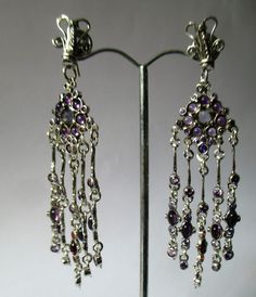 From Porans collection ----> Unique long Chandelier Earrings, 90 stones! (45 each). Gemstone and CZ A gift to your beloved It can be cheaper with different stones. Onyx, Garnet, Amethyst, Moonstone, Opal... Dimensions: Max Length: 90 mm\ 3.6 inches (from the top of the wire) Max Width: 23 mm\ 0.92 inches An amazing gift for yourself or loved ones! It comes in a beautiful jewelry gift box. We can also add a personal note in case you would like us to send it as a gift to a loved one. For more i Long Chandelier, Gift For Love, Earring Gift, Long Dangle Earrings, Amethyst Earrings, Multi Stone Ring, Silver Earring, Multi Stone, Jewelry Gift Box