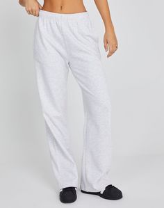 These sweatpants feature a mid rise waist, wide leg fit and an elastic waist. Elevated Casual Relaxed Fit Sweatpants With Ribbed Waistband, Trendy Wide Leg Sweatpants For Fall, Casual Wide Leg Sweatpants For Fall, Elevated Casual Sweatpants With Ribbed Waistband, Athleisure Straight Leg Bottoms For Elevated Casual, Sporty Wide Leg Spring Joggers, Sporty Cotton Wide Leg Pants With Straight Hem, Elevated Casual High-waisted Sweatpants With Elastic Waistband, Sporty Relaxed Fit Wide-leg Sweatpants