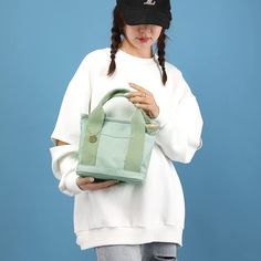 〖Simple Japanese style〗 The plain canvas material is matched with a retro version, with a strong Japanese style, which can be used as a daily bag with various clothes, simple and versatile 〖Daily Size〗The size is 9*8.3*6in, which can accommodate daily items such as A4 books, MINI tablets, mobile phones, small cosmetic bags, wallets, etc. Hardware zipper, smooth opening and closing, regular stitching 〖Fine workmanship〗 This hobo handbag is made of thick and durable high-density canvas, which is w Trendy Solid Color Shoulder Bag For School, Trendy School Shoulder Bag In Solid Color, Solid Canvas Shoulder Bag For School, Retro Green Everyday Bag, Solid Color Shoulder Canvas Bag For School, Green Retro Everyday Bag, Casual Canvas School Bag In Solid Color, Trendy Solid Color Canvas Bag For School, Trendy Solid Color School Bags