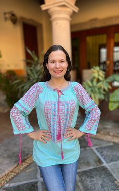 Beautiful and fresh handmade blouse embroidered in cross stitch, 3/4 sleeve, with embroidered details and laces on the neck and cuffs. made of fresh cotton, to be used on any occasion. We ship anywhere in the word, from Tepic, Nayarit,  mx. Made by artisans from Oaxaca, Mx We recommend washing by hand with cold water, tender in the shade, to better preserve the original color. Cotton Blouse With Embroidered Cuffs, Long Sleeve Cotton Blouse With Embroidered Cuffs, Bohemian Cotton Blouse With Embroidered Cuffs, Casual Cotton Blouse With Embroidered Cuffs, Fall Cotton Blouse With Embroidered Cuffs, Summer Long Sleeve Blouse With Embroidered Cuffs, Cotton Long Sleeve Blouse With Floral Embroidery, Long Sleeve Blouse With Embroidered Cuffs, Cotton Long Sleeve Tops With Embroidered Cuffs