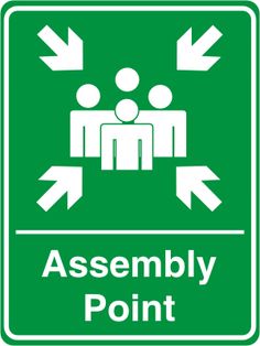 an assembly point sign with arrows pointing in different directions