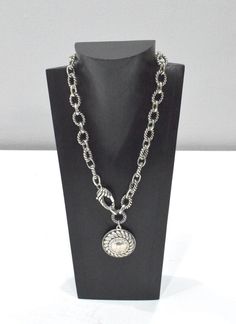 This is a Really Stylish Silver Rope Chain Rhinestone Pendant Necklace with a front Toggle Clasp.. A great necklace to wear with suits or casual clothing.  A real statement necklace to adorn all your favorite outfits. Necklace 22 Inches Long    Pendant 2 Inches Round Chain 9 Inches Long 3/4 Inch Links AT BACARA WE STAND BEHIND ALL OF OUR MERCHANDISE. FULL MONEY BACK GUARANTEE WILL BE PROVIDED FOR DISSATISFIED CUSTOMERS. YOUR SATISFACTION IS OUR MAIN GOAL, AND WE THANK YOU FOR SHOPPING AT THE WOR Silver Rope Chain, Long Pendant, Chain Pendant, Casual Clothing, Toggle Clasp, Rope Chain, Chain Pendants, Pendant Necklaces, Silver Fashion