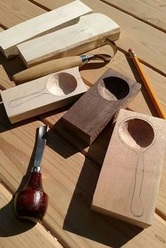 some woodworking tools are laying on a wooden table