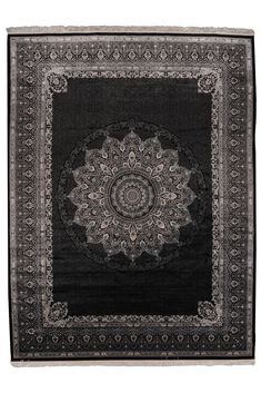 a black and white rug with an intricate design on the center, in front of a white background