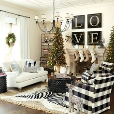 a living room filled with furniture and christmas decorations