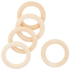 four wooden rings on a white background