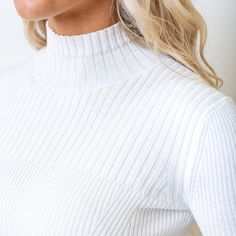 Crafted from our soft organic cotton, our mock neck sweater is a fantastic addition to your fall wardrobe. Features sculpted rib knit details throughout to highlight the contours of the body for an especially flattering look. We love this clean look paired with jeans or leggings and flats with a pop of color! Knit Turtleneck Mock Neck Top For Fall, Fall Knit Mock Neck Turtleneck Top, Winter Knit Mock Neck Top, Winter High Neck Knit Mock Neck Top, Winter Knit High Neck Mock Neck Top, Fall Mock Neck Top For Layering, Ribbed Cotton Knit Top For Fall, Fall Layering Mock Neck Knit Top, Knit Mock Neck Top For Fall Layering