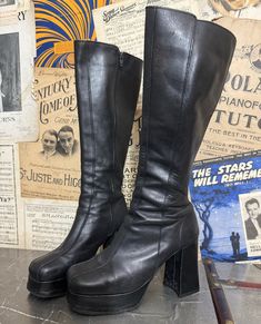 Landing soon. Very good vintage condition. Reservations welcome. Vintage Faux Leather Boots For Fall, Vintage Faux Leather Winter Boots, Vintage Winter Boots In Faux Leather, Retro Leather Platform Boots For Fall, Retro Knee-high Platform Boots, Retro Leather Boots For Streetwear, Fitted Leather Platform Boots For Concerts, Vintage Faux Leather Boots With Round Toe, Vintage Faux Leather Round Toe Boots