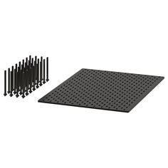 the black peg board is next to several pieces of screws and nails on a white background