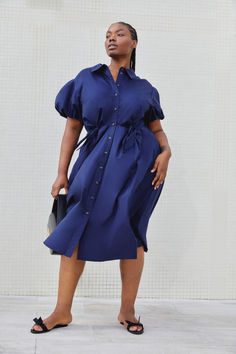 A signature silhouette, the Elza Dress is a staple midi dress in new seasonal colorways. Designed in a lightweight luxe cotton, Elza is our tailored approach to a classic shirt dress. Chic Knee-length Shirt Dress For Office, Chic Office Midi Dress With Placket, Elegant Cotton Dress With Spread Collar, Classic Knee-length Shirt Dress For Dress Down Days, Elegant Cotton Collared Dress, Classic Knee-length Shirt Dress For Casual Wear, Elegant Collared Cotton Dress, Classic Knee-length Casual Shirt Dress, Chic Cotton Shirt Dress For Formal Occasions