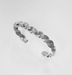 925 Sterling Silver Wire Braided Cuff bracelet Handcrafted 3 Strand wire by silver smith. Good quality, charming design. good for birthday, anniversary, Christmas gift made of : 925 Genuine sterling silver (Not silver plate, Nor silver coated) Size : 7, 71/2, 8 inch wrist. Weight : 15.3 g Sterling Silver Braided Bangle Bracelet, Sterling Silver Braided Bracelet With Silver Clasp Gift, Handmade Silver Braided Sterling Silver Bracelet, Sterling Silver Braided Bangle Bracelet As Gift, Silver Sterling Silver Braided Bangle Bracelet, Sterling Silver Cuff Bracelet With Clasp As Gift, White Gold Sterling Silver Braided Bracelet For Gifts, White Gold Sterling Silver Braided Bracelet As Gift, Sterling Silver Nickel-free Cuff Bracelet For Anniversary