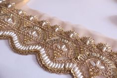 ♦ Feel Free to Message Me if Unable to Place your Order ♦ Indian Embroidered Laces and Trims Saree Border Fabric Trim By The Yard. Width : Approx. 6cm wide Length : 3,6,9 yards This beautiful lace trim is great for any sewing and craft projects. A perfect match for bridal dresses or any festive occasions. Our lace will add charm to your fabric, you can use this lace alone or add it with other laces to create a new unique design for, any of your project : ➤Dress border, saree, dupattas, scarves a Diy Crafts Love, Diy Belts, Golden Lace, Border Lace, Border Fabric, Fancy Sarees Party Wear, Border Saree, Golden Beads, Lehenga Gown