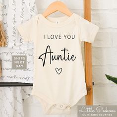 I Love You Auntie Toddler Tee, Kids Shirt or Baby Onesie®. Little Peekoos™ is the place to find trendy, funny and cute Onesie's®, toddler tees, kid's shirts and raglan's for your baby, toddler, or young child which are perfect for photographs, family trips or your holiday celebration. Our goal is to provide Cute Kids Clothes with Fun Expressive Designs for all occasions. Our trendy and custom designs are professionally printed in house and ships either same day or next business day. We take grea Auntie Baby, Cute Onesies, Gift For Aunt, Family Trips, Aunt Gifts, Raglan Shirts, Toddler Tees