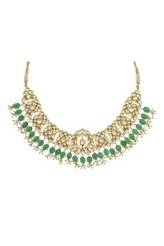 Gold polish necklace with lotus cut work design, stones, green onyx, pearls embellishment and drop tassel details. Paired with embellished dangler earrings. - Aza Fashions Elegant Green Kundan Necklace With Latkans, Green Gemstone Necklace For Reception, Elegant Green Bridal Necklace With Latkans, Green Meenakari Necklace For Reception, Green Beaded Necklace For Reception, Green Kundan Necklaces With Latkans, Elegant Green Temple Necklace With Latkans, Festive Green Gemstone Bead Necklaces, Festive Green Gemstone Beads Necklace