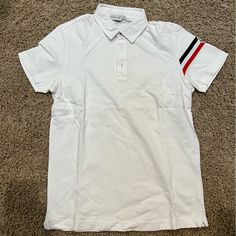 Moncler Polo Purchased In Madrid In 2009, Rare, Dead Stock Never Worn Designer White Collared Shirt, Designer White Polo Shirt, Designer White Collared Top, Moncler Sweater, Polo Tee Shirts, Navy Polo Shirt, Moncler Jacket, White Polo Shirt, Polo Tees