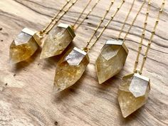 "Real crystal points in your choice of yellow Citrine or pink Rose Quartz dipped in gold electroplating! These stones measure approximately 20-25mm x 30-40mm. Chains are available in your choice of length: 18\" for a standard necklace length, 24\" for medium length, or 30\" for long length. You may also choose your chain finish: Real 14K Gold filled or Gold plated. I highly recommend the real 14K Gold filled chains as they are tarnish resistant & hypoallergenic! Finally, you may choose your Raw Citrine Necklace, November Birthstone Jewelry, Cash Crop, Crystal Point Necklace, Raw Citrine, Raw Rose Quartz, Citrine Jewelry, Citrine Necklace, Yellow Citrine