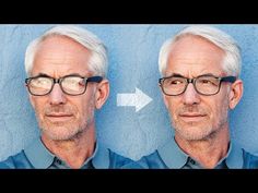 an older man with white hair and glasses is looking at the camera while standing in front of a blue wall