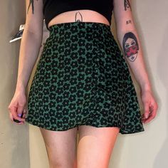 No Flaws! Never Worn Out. Would Be So Cute For Spring And Summer. Zips Up The Sides And Has Cute Button Detailing. Elastic Waistband As Well Smoke Free Home Cheap High-waist Skirt From Urban Outfitters, Casual Green Floral Print Skirt, Green Flared Skirt With Floral Print, Fitted Floral Print Mini Bottoms, Black Floral Print Mini Bottoms, Black Floral Print Mini Length Bottoms, Trendy Floral Print Flowy Mini Skirt, Floral Print Mini Skort, Trendy Fitted Floral Print Skort