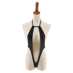 Unleash your daring side with our Daredevil Extreme Micro Thong Monokini Swimsuit. This bold and daring swimwear features a revealing thong design, perfect for your next private pool session. Step up your swim game and make a statement with this seductive swimsuit. This stunning micro monokini is crafted from high-quality Nylon/Spandex, ensuring a soft, stretchy, and comfortable fit. Material: Nylon/Spandex Adjustable Backless Swimwear For Party, Adjustable Backless Party Swimwear, Backless Party Swimwear With Boning, Black T-back Swimwear For Party, Black T-back Party Swimwear, Party Beachwear String Swimwear, T-back Swimwear For Beach Party, Party Bodysuit With Lined Body And T-back, Triangle Top Bodysuit For Club With Lined Body