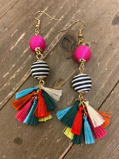 Pink tiful of LOVE More than an Online Store www.pinktifuloflove.com rpink80@pinktifuloflove.com Fast Shipping Great for Gifts Secure Payment Satisfaction Guaranteed I LOVE This Fiesta Tassel Wire Earrings Wear these bold and fabulous Fiesta Tassel Earrings! Bright and colorful, these earrings feature thread-wrapped round beads with dangling multi-colored tassels at the bottom. Details: Length: 2 5/8" Width: 1" Metal Color: Gold One of a kind, fashion jewelry, everyday jewelry. Perfect gift for Fiesta Jewelry, Jewelry Everyday, Mexican Earrings, Pearl Necklaces, Special Girl, Love More, Trendy Earrings, Wire Earrings, Everyday Jewelry