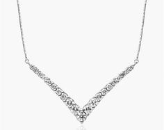 14K White Gold Lab-Created Diamond Graduated V Shape Bar Necklace. Top off any attire with this scintillating diamond necklace. Crafted in 14K gold, this elegant design features a V-shaped row of graduated-size diamonds. The bar is attached to a box chain and that secures with a spring-ring clasp. The necklace measures 18inches with an extra jump ring at 16 inches for versatility. Necklace Top, Diamond Necklaces, Grade 8, Lab Created Diamonds, Box Chain, The Bar, Bar Necklace, Jump Rings, Stone Bracelet