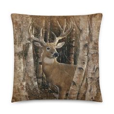 a deer is standing in the woods on a pillow cover with an image of it's head and antlers