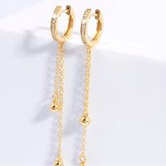 Chic Golden Tassel Bead Earrings 18k Gold Plated Jewelry Gift Women Accessories Excellent As A Gift 18 K Gold Plated Elegant Adjustable Chain Hoop Earrings As Gift, Elegant Hoop Earrings With Dangling Charms For Gift, Elegant Hoop Earrings With Dangling Charms As Gift, Elegant Hoop Earrings With Adjustable Chain As Gift, Elegant Hoop Earrings With Dangling Charms, Elegant Gold Tassel Earrings As Gift, Elegant Gold Tassel Earrings For Gift, Yellow Gold Drop Tassel Earrings, Minimalist Gold Earrings With Dangling Beads