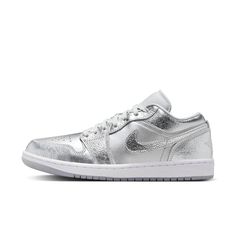 Introducing The Stylish And Eye-Catching Jordan 1 Low Se Metallic Silver Sneakers, Exclusively Designed For Women. These Sneakers Are A Perfect Blend Of Fashion And Comfort, Making Them A Must-Have For Any Sneaker Enthusiast. The Metallic Silver Color Adds A Touch Of Elegance And Sophistication To Your Outfit, Making You Stand Out From The Crowd. With A Size 5.5, These Sneakers Offer A Perfect Fit For Those With Smaller Feet. Whether You're Hitting The Streets Or Heading To A Casual Gathering, T Jordan Retro 1 Low, Jordan Model, Jordan Retro 1, Silver Sneakers, Womens Air Jordans, Retro 1, Air Jordan 1 Low, Jordan 1 Low, Air Jordans Retro