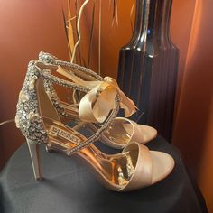 Badgley Mischka Satin Sandals With Crystal And Jeweled Embellishments. 3.8" Covered Stiletto Heel. Open Toe. D'orsay Silhouette. Adjustable Ankle Strap. Leather Lining And Sole. "Tampa" Is Imported. Any Marks Come From Try On. Red Carpet Ready Glamorous Champagne Sandals For Events, Champagne Embellished Open Toe Heels, Glamorous Champagne Evening Sandals, Champagne High Heel Sandals For Cocktail, Glamorous Embellished Open Toe Wedding Shoes, Glamorous Embellished Heels For Gala, Embellished Glamorous Wedding Shoes For Gala, Glamorous Embellished Wedding Shoes For Gala, Champagne Embellished Ankle Strap Wedding Shoes