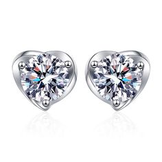 These Four Claw Heart Moissanite Stud Earrings feature a timeless design that will sparkle for generations. Crafted with four claws, this setting ensures maximum durability and brilliance while the heart cut enhances the fiery luster of the Moissanite. Perfect as a gift. Product Details: Material: 925 Sterling Silver Stone: Moissanite Diamonds/D /0.5 carat Weight: about 1.75g Size: 5mm SKU: AE23110319 Keywords: moissanite earrings, moissanite stud earrings, moissanite earrings studs, moissanite