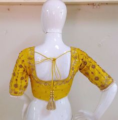 Pure raw silk blouse with maggam work on neck sleeves and back neck. Custom fitted. -Measurements sheet will be sent to you once you order( Standard sizing also available) -Custom colors available -Work on front back and sleeves. Luxury Yellow Unstitched Blouse, Semi-stitched Silk Yellow Blouse Piece, Silk Yellow Blouse Piece With Cutdana, Yellow Semi-stitched Silk Blouse Piece, Navratri Yellow Silk Blouse Piece, Yellow Silk Blouse Piece For Navratri, Fitted Yellow Blouse For Festivals, Yellow Raw Silk Blouse Piece With Zari Work, Yellow Silk Choli With Resham Embroidery