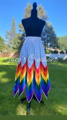 a dress made out of rainbow colored fabric