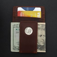 You are looking at a gorgeous Magnetic Money Clip and Wallet Combo, set with an authentic United States 1946 ~ 1964 Roosevelt Dime 90% Silver 10 Cent Coin. The coin is average circulated and in great condition. You need to pick a year from pull-down menu. The wallet is about 4.25"(108 mm) x 3.00"(75 mm), made of high quality Crazy Horse Water Buffalo Leather, brown color, brand new and has never been used before. It features a magnetic money clip with two card slots in front, four card slots on Vintage Rfid Blocking Wallets For Daily Use, Vintage Wallets With Rfid Blocking For Daily Use, Everyday Vintage Wallet With Rfid Blocking, Vintage Trifold Wallet With Rfid Blocking For Travel, Vintage Trifold Wallet With Coin Pocket, Retro Bifold Wallets With Coin Pocket, Classic Rfid Blocking Coin Purse, Vintage Trifold Wallet With Rfid Blocking For Daily Use, Vintage Trifold Wallet With Coin Pocket For Travel