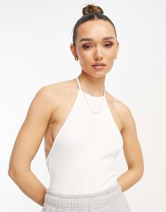 Top by ASOS DESIGN It's a yes from us High neck Open, T-back bodycon fit Ribbed Bodycon Tops For Summer, Ribbed Bodycon Summer Tops, Summer Ribbed Bodycon Tops, White Bodycon Top For Night Out, White Bodycon Bodysuit For Spring, White Stretch Backless Tank Top, White Fitted Backless Bodysuit, White Backless Top For Night Out, Trendy White Ribbed Bodysuit