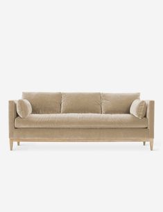 Modern Parisian Sofa, Airy Modern Living Room, Modern Velvet Couch, Tan Velvet Couch, Beige Velvet Couch, Dark Brown Velvet Sofa, Simple Couches Living Room, Sand Colored Couch, Camel Velvet Sofa Living Room