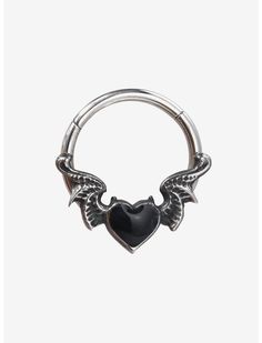 a heart shaped ring with wings on it