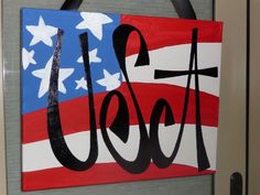 a patriotic sign with the word love painted on it