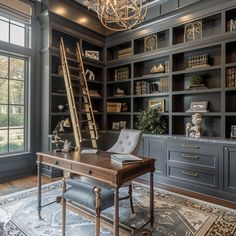 a home office with built - in bookshelves, desk and ladder to the ceiling