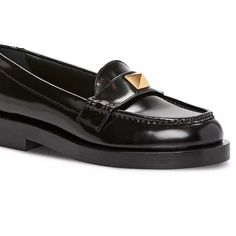 Valentino Garavani Women's Roman Stud Moc Toe Loafers Black Leather Loafer With Gold Stud Detail Fits True To Size, Order Your Normal Size Almond Moc-Stitch Toe Slip On Signature Pyramid Stud Detail At Instep Leather Upper, Lining And Sole Made In Italy Classic Formal Loafers With Studded Rubber Outsoles, Luxury Black Moccasins For Work, Elegant Black Loafers With Studded Rubber Outsoles, Designer Pointed Toe Loafers For Work, Chic Formal Loafers With Studded Rubber Outsoles, Designer Black Moccasins For Work, Luxury Moccasins For Workwear In Fall, Luxury Fall Moccasins For Workwear, Luxury Formal Flats For Fall